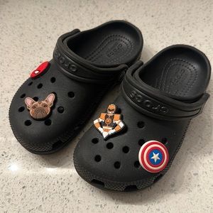 Children's Crocs. Size 10C. Great condition comes with the Jibbets.